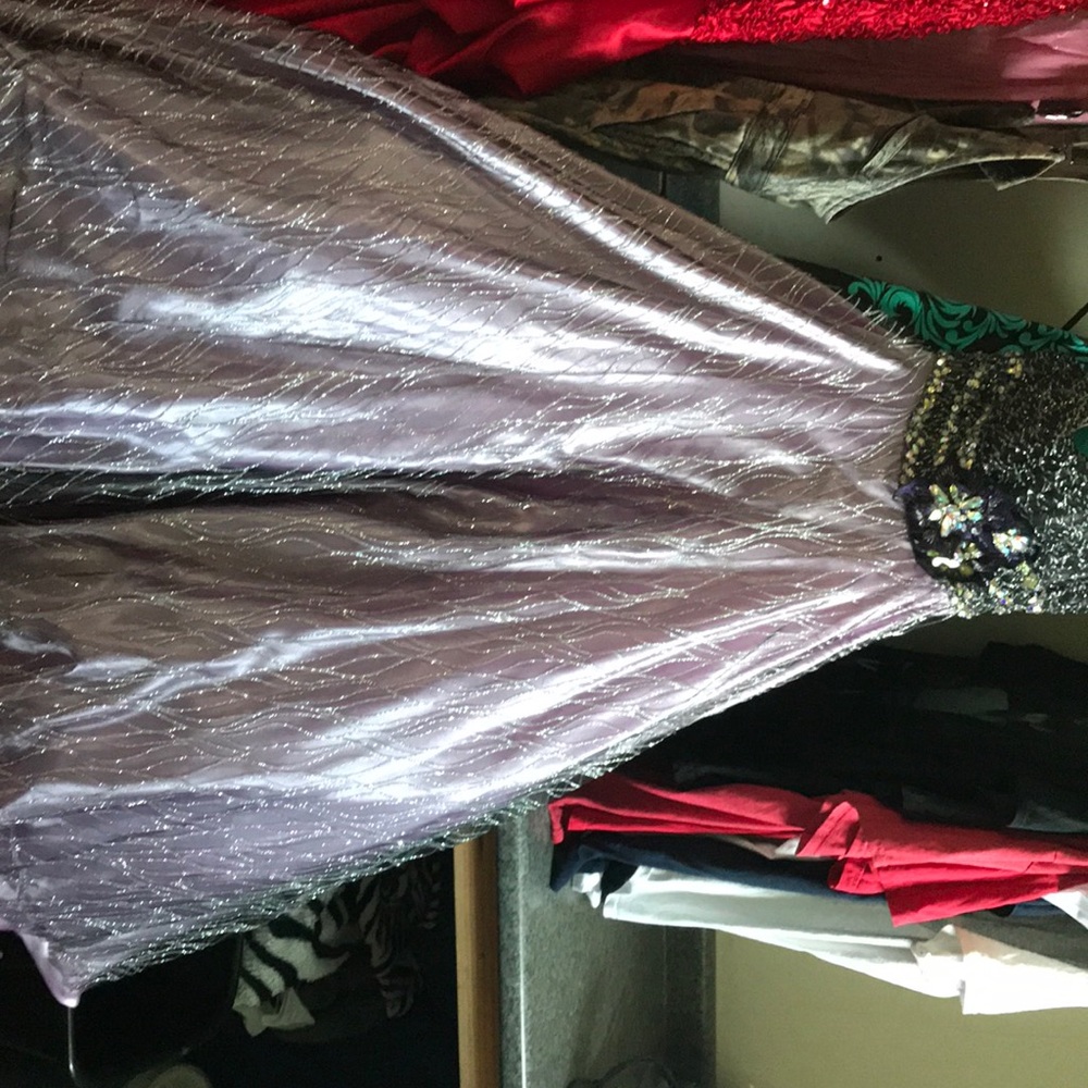 A purple and black prom dress